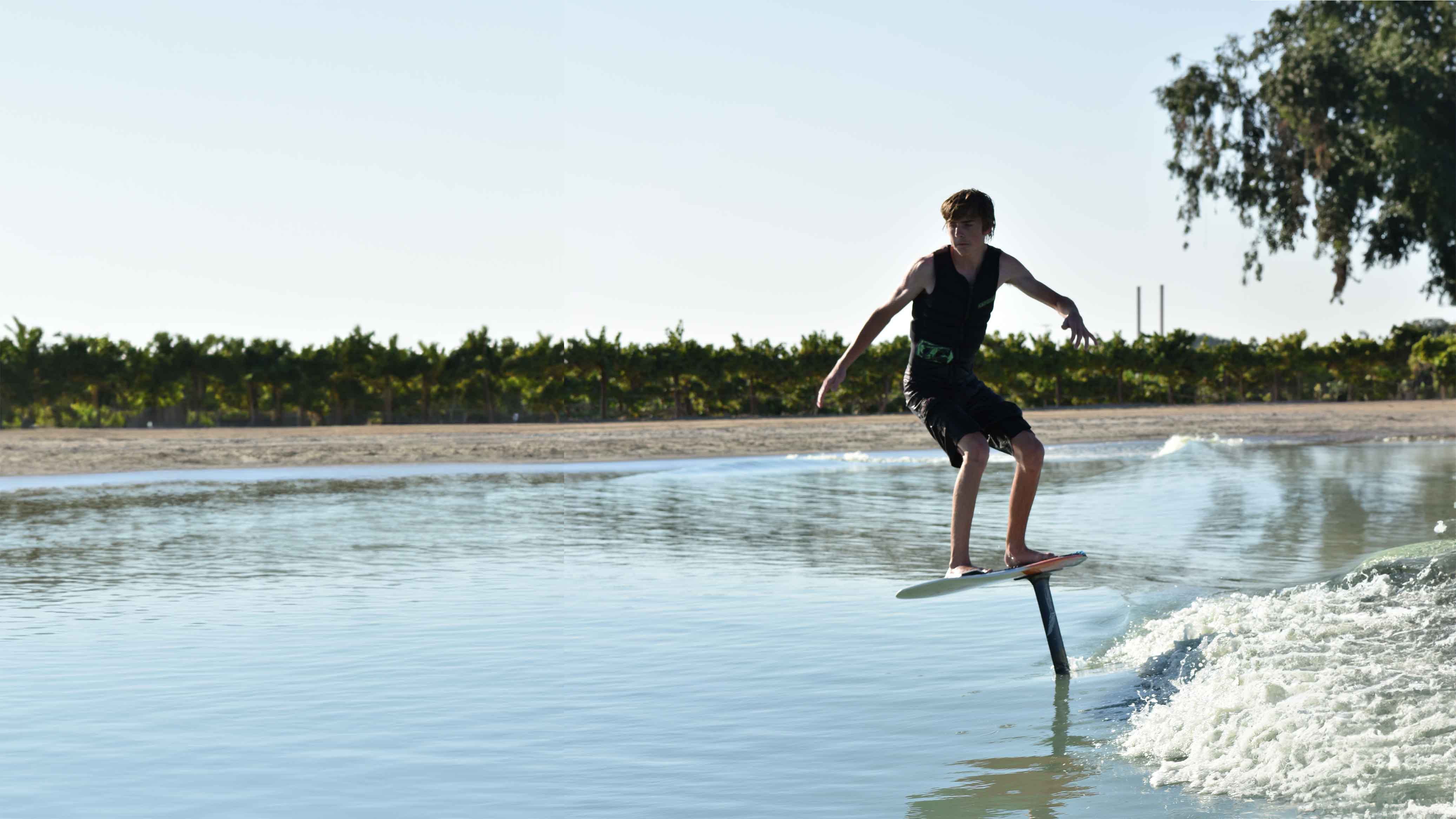 Wake foil surfing